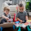 BABY EINSTEIN Hračka dřevěná hudební kytara Together in Tune Guitar™ Connected Magic Touch™ HAPE 6m+