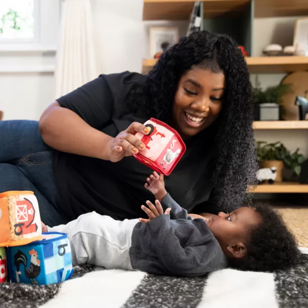 BABY EINSTEIN Hračka textilní kostky abeceda Alpha Stacks™ 4ks, 3m+