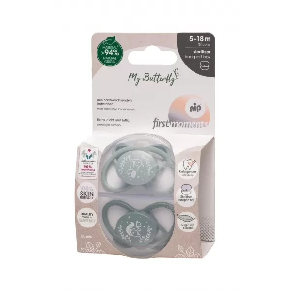 NIP FIRST moments šidítko Motýlek, silikon, v.2 / 5-18m, mix barev