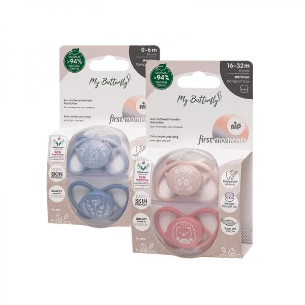 NIP FIRST moments šidítko Motýlek, silikon, v.2 / 5-18m, mix barev